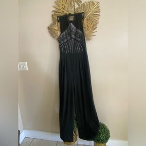 Chic Black Backless Jumpsuit with Embellished Bodice